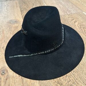 Never worn michel mason black hat with zipper detail. Size m.